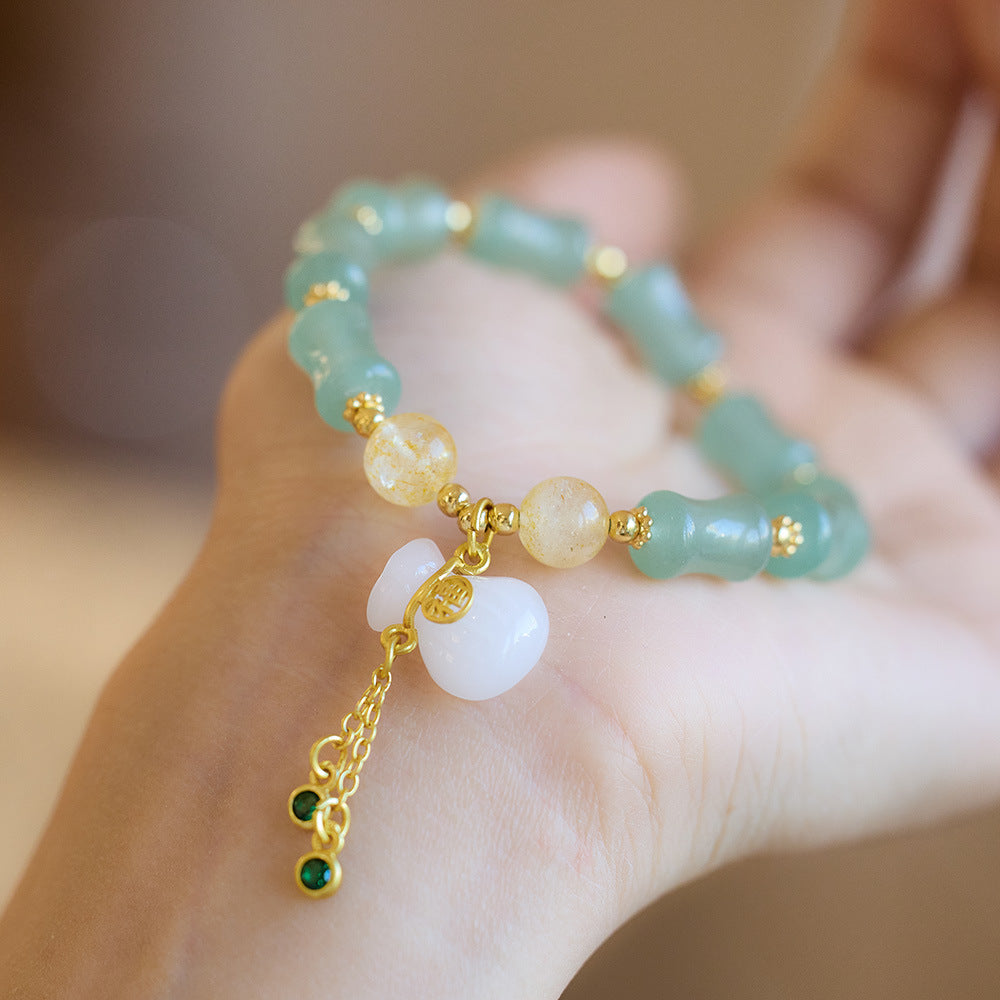 New Chinese natural gold silk jade bracelet female / Tianshan Cuizhu Festival money bag single circle bracelet / Gobi jade hand string