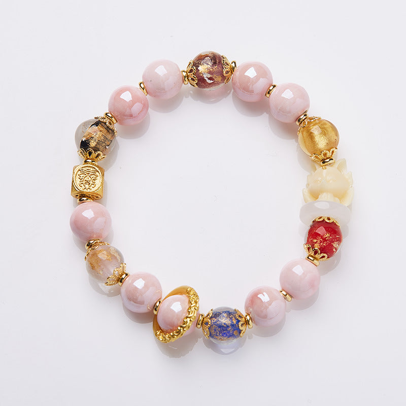 Yongxiang with Beijing ash glazed hand string / powder porcelain nine-tailed fox gold leaf good luck bracelet / girlfriend gift