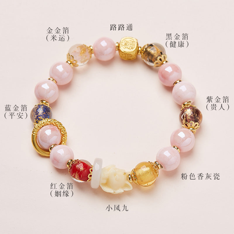 Yongxiang with Beijing ash glazed hand string / powder porcelain nine-tailed fox gold leaf good luck bracelet / girlfriend gift