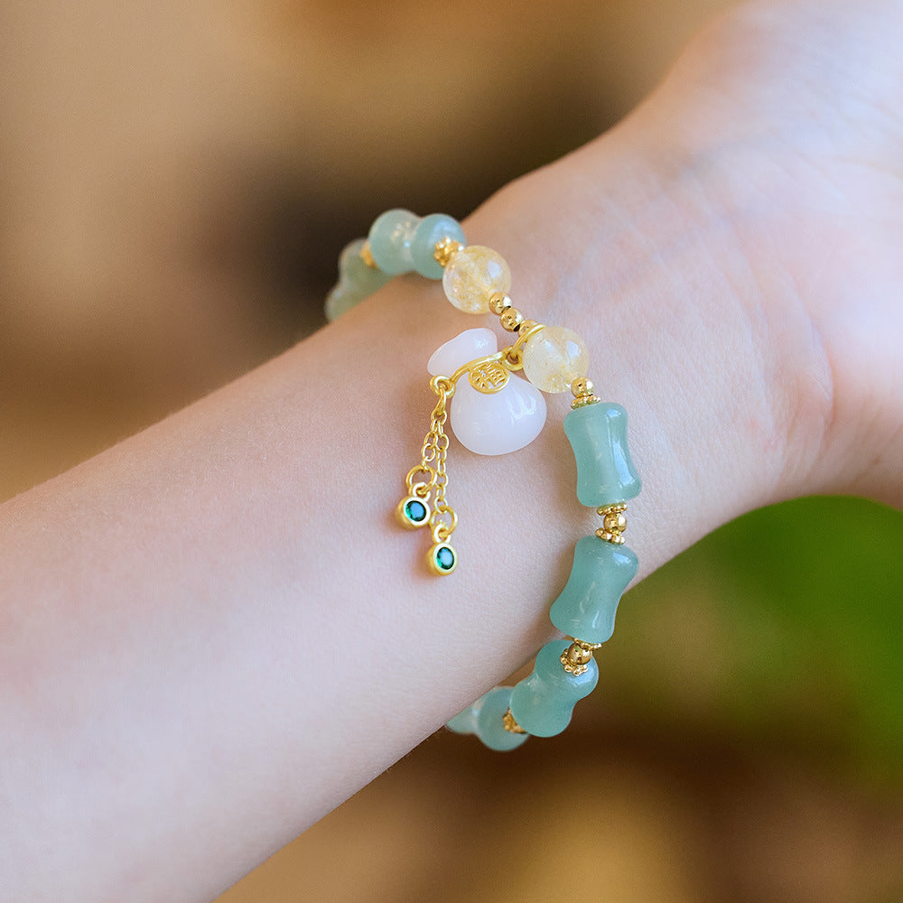 New Chinese natural gold silk jade bracelet female / Tianshan Cuizhu Festival money bag single circle bracelet / Gobi jade hand string