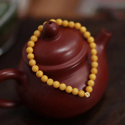 Natürliches gelbes Hühnerfett-Bienenwachs-Perlenarmband, weibliches Bernstein-Hetian-Jade-Einzelring-Armband, Retro-Chinoiserie