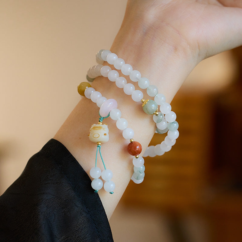 Xinjiang Natürliches Dreikreis-Goldseide-Jade-Armband für Frauen Tianshan Jadeit-Stein108Neues chinesisches Armband