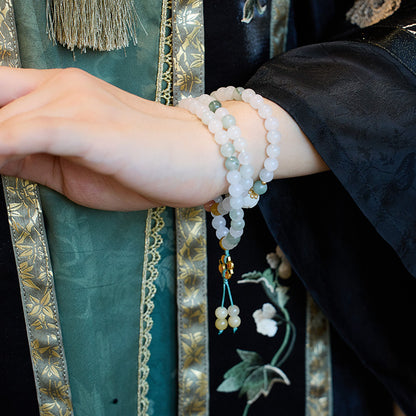 Xinjiang Natürliches Dreikreis-Goldseide-Jade-Armband für Frauen Tianshan Jadeit-Stein108Neues chinesisches Armband