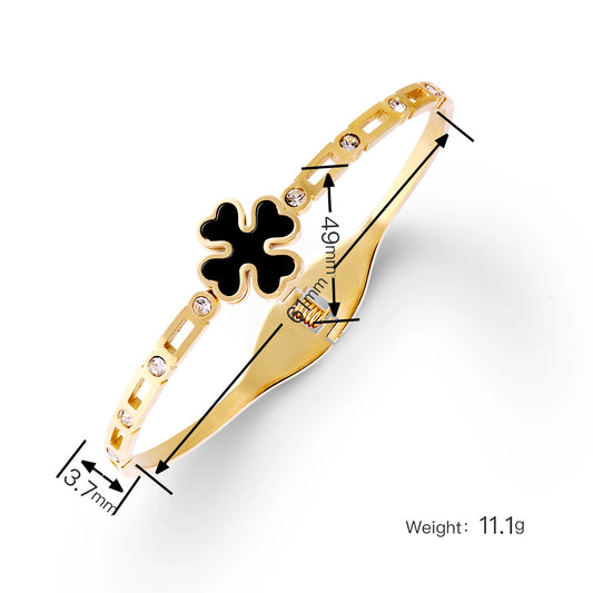Four-leaf clover diamond-encrusted gold bracelet